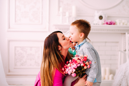 Portrait of a happy mother and her children in studioの写真素材