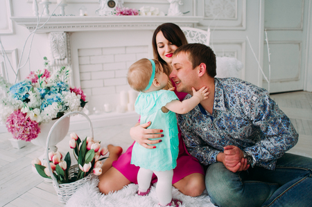 Beautiful family portrait spending time together at studioの写真素材