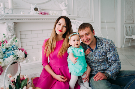 Beautiful family portrait spending time together at studioの写真素材