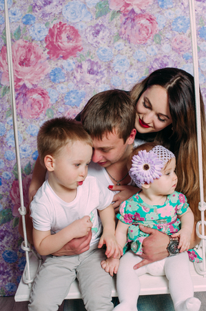 Beautiful family portrait spending time together at studioの写真素材