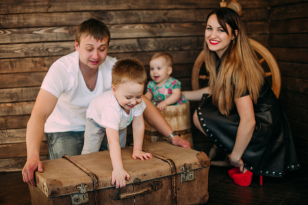 Beautiful family portrait spending time together at studioの写真素材