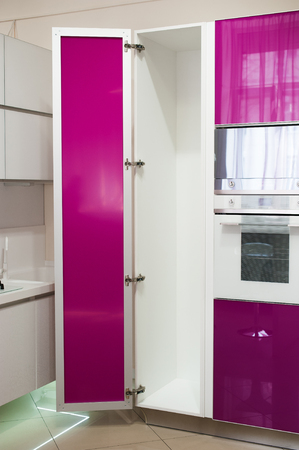 Detail of modern pink kitchen.の写真素材