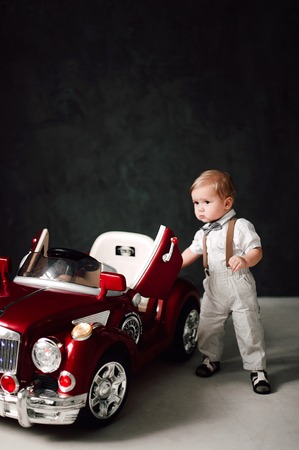 two babies - boy and girl dressed as bride and groomの写真素材
