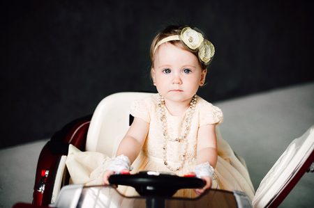 two babies - boy and girl dressed as bride and groomの写真素材