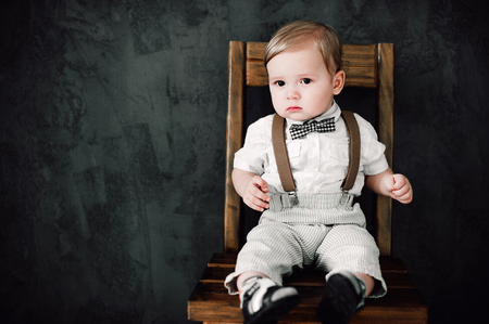 two babies - boy and girl dressed as bride and groomの写真素材