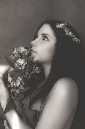 Portrait of young girl in gothic dress with black necklaceの写真素材