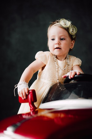 two babies - boy and girl dressed as bride and groomの写真素材