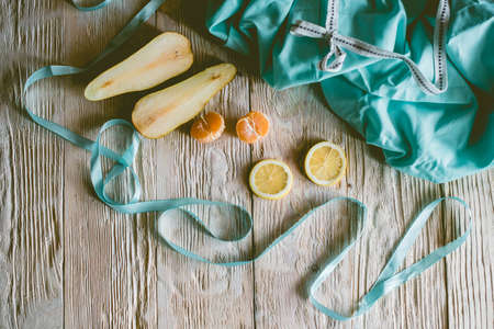 Citrus fresh fruits on a wooden table, close-up.の写真素材