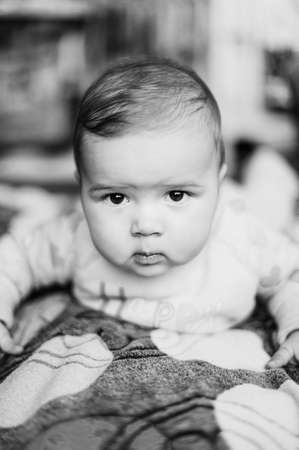 Baby boy at home. close up portrait .black and whiteの写真素材