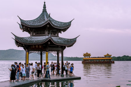 beautiful the west lake scenery, landscape with sunset in hangzhou,China.のeditorial素材