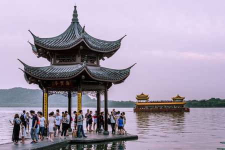 beautiful the west lake scenery, landscape with sunset in hangzhou,China.のeditorial素材
