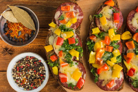 Sandwiches with sausage,cheese and pepper
