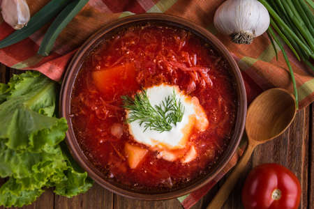 Borscht traditional ukrainian and russian soup made of beetroot, tomato, cabbage, carrot and beefの写真素材