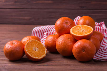 Delicious and beautiful fresh tangerines whole and slicedの写真素材