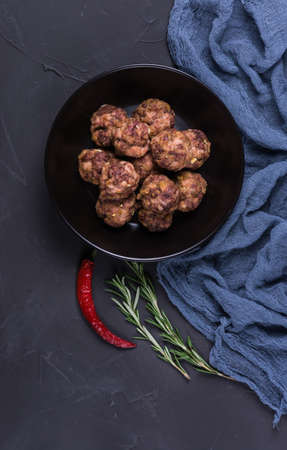 Homemade roasted meatballs with rosemary,pepper and garlic