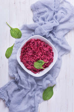 Homemade beetroot salad with spinach and walnutsの写真素材