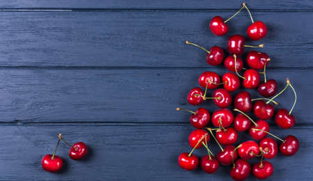 Fresh sweet cherries with stalks large collection of fresh red cherriesの写真素材