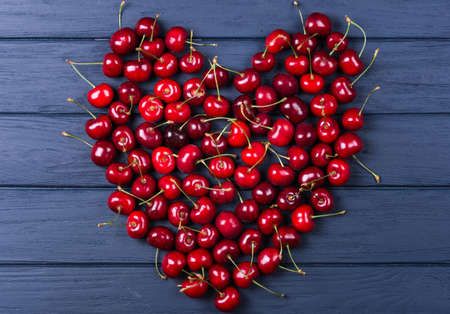 Fresh sweet cherries with stalks large collection of fresh red cherriesの写真素材