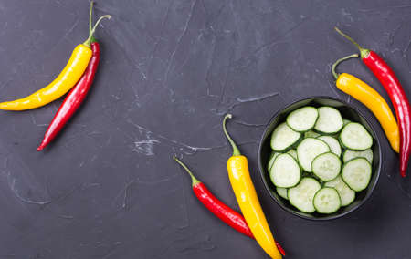 Cucumber cut in bowl as ingredient for saladの写真素材