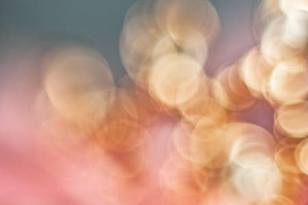 Multi-colored blurred bokeh. Close-up. The background.