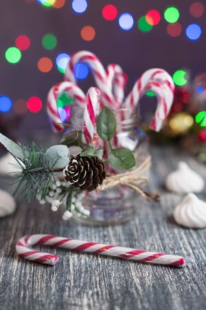 Christmas candy on table on light backgroundの写真素材
