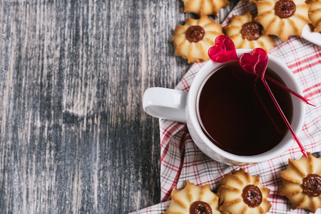Tea with cookies on wooden backgroundの写真素材