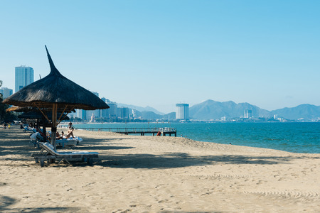 Straw roof of beach umbrella. Blue sea and skyの写真素材