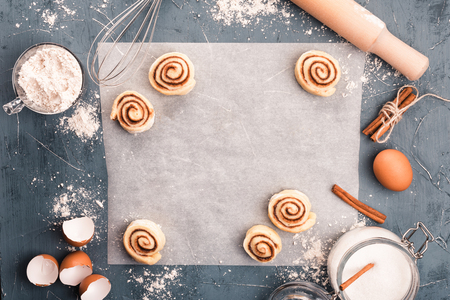 Homemade sweet buns on baking paper. Top view. Cope spaceの写真素材