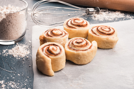 Homemade sweet buns on baking paper. Top view. Cope spaceの写真素材