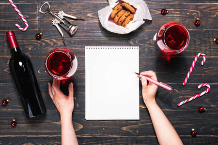 Bottle and glasses of red wine, Christmas ornamentsの写真素材