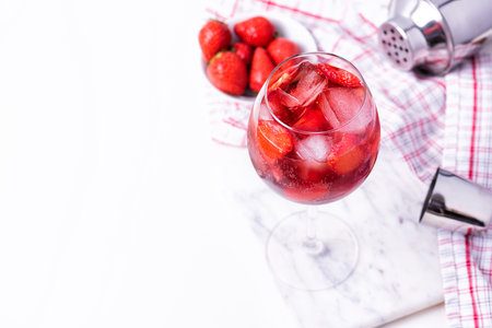 Wine glass of strawberry alcohol aperol or daiquiri cocktail.の写真素材
