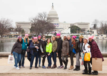 Group of women in front of the US Capitol after protesting President Trump's positions on women's and other human rights.のeditorial素材