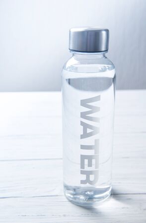 Bottle of water with word water on it, healthy life concept