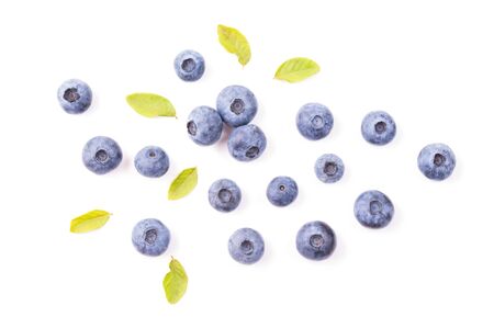 Blueberries with leaves isolated on white background, top viewの写真素材