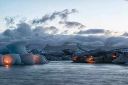 Icebergs with candles, Jokulsarlon ice lagoon before annual firework show, Icelandの写真素材