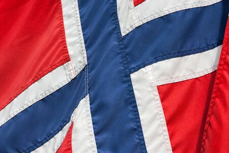 Close up of the blue and red Norwegian National flag