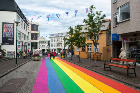 REYKJAVIK, ICELAND - AUGUST 19, 2015: Main pedestrian street colored with pride colors and decorated...