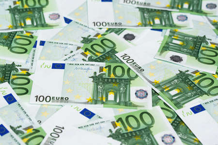 One hundred Euro banknotes, money background, finance and banking concept