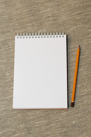 a simple pencil and clean the notebookの写真素材