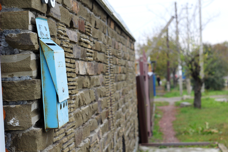 mailbox on a brick wall on the streetの写真素材