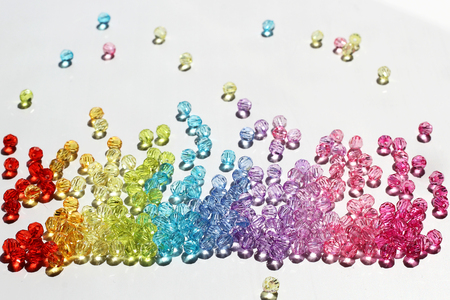 Colorful beads for background and backdrop on whiteの写真素材