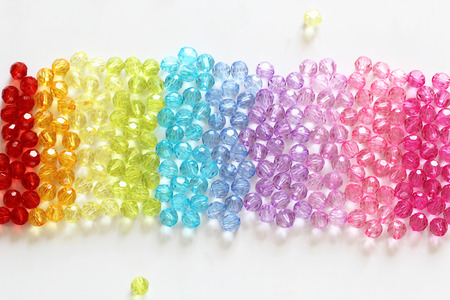 Colorful beads for background and backdrop on whiteの写真素材