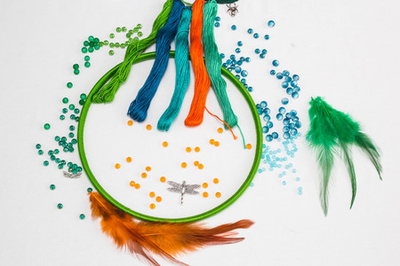 set for making a Dreamcatcher, beads, thread on a white backgroundの写真素材