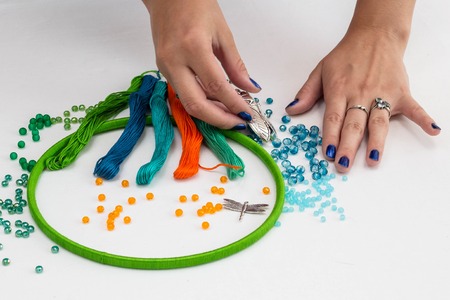 set for making a Dreamcatcher, beads, thread on a white backgroundの写真素材