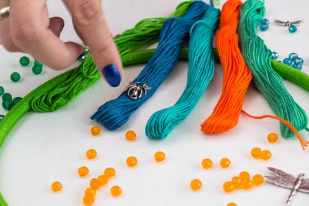 set for making a Dreamcatcher, beads, thread on a white backgroundの写真素材