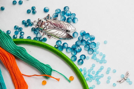 set for making a Dreamcatcher, beads, thread on a white backgroundの写真素材