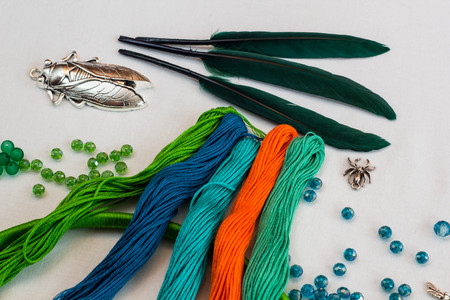 set for making a Dreamcatcher, beads, thread on a white backgroundの写真素材