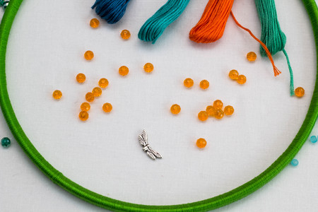 set for making a Dreamcatcher, beads, thread on a white backgroundの写真素材
