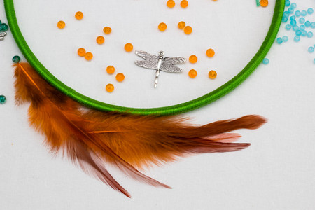 set for making a Dreamcatcher, beads, thread on a white backgroundの写真素材