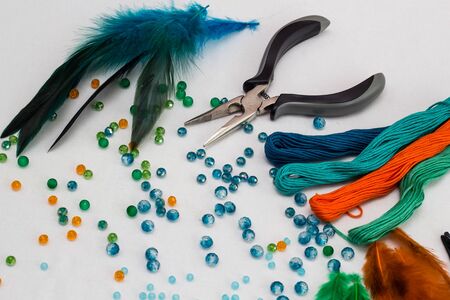 set for making a Dreamcatcher, beads, thread on a white backgroundの写真素材